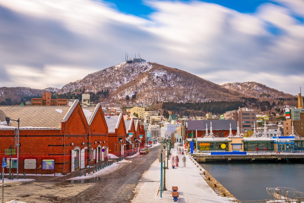 Hakodate, Japan cityscape at the historic Red Brick Warehouses and Mt. Hakodate