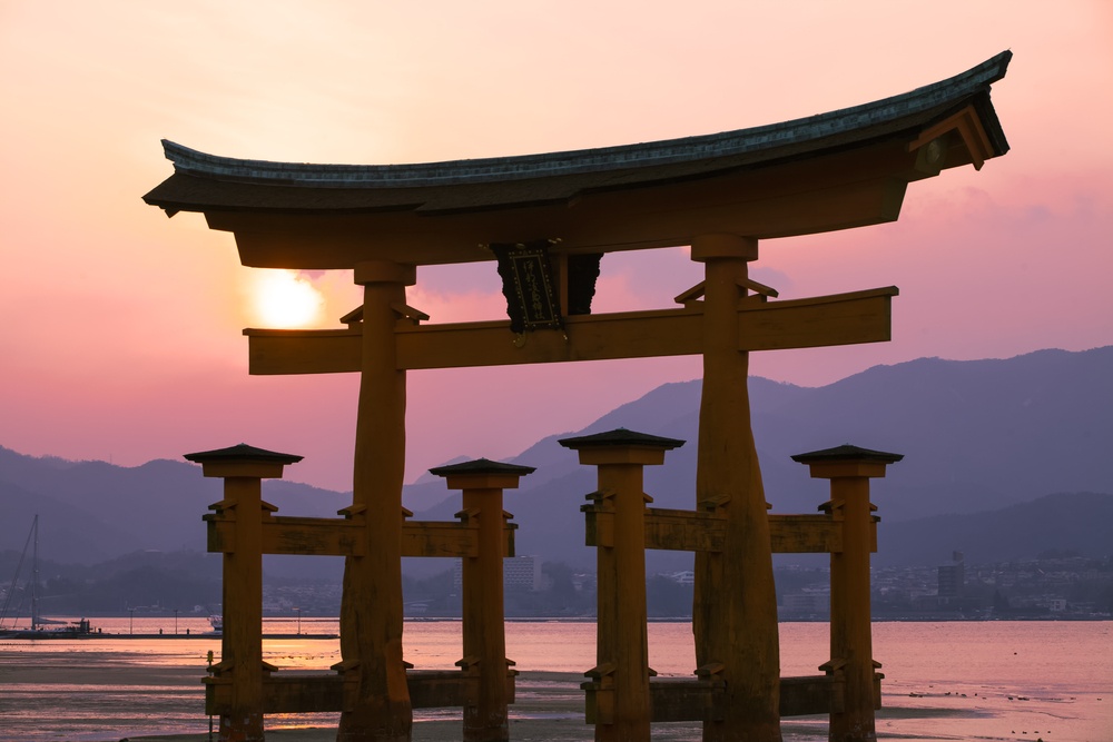 The great Torii Symbol of Miyajima island in sunset tiwilight